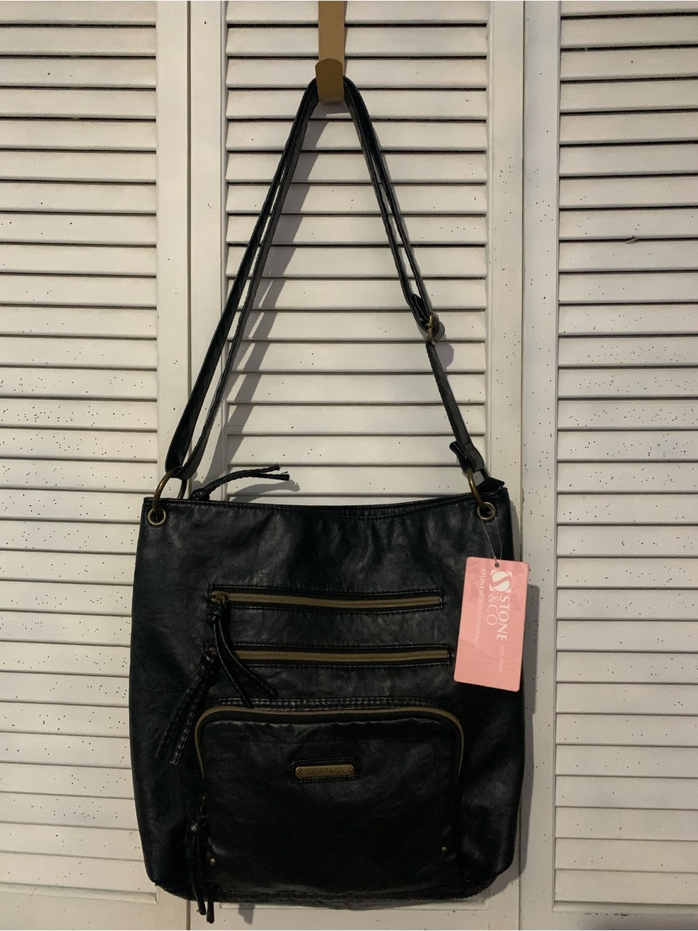 Stone & Co. Black Leather Shoulder Bag with Front Zip Pockets Gold Hardware
